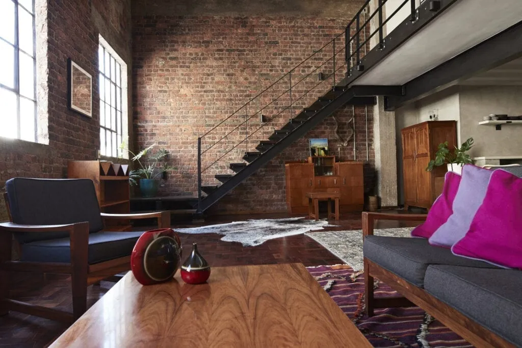 Small Loft Featuring Bright, Vividly Colored Spaces