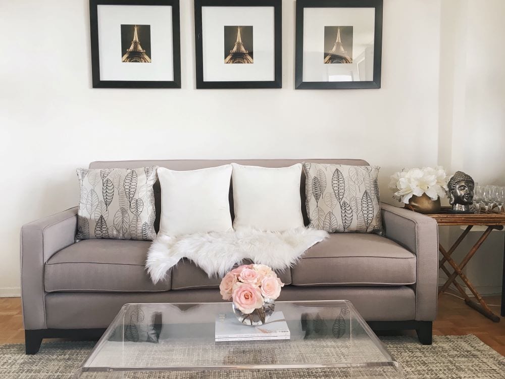 Living room interior design, flowers as centerpiece of coffee table