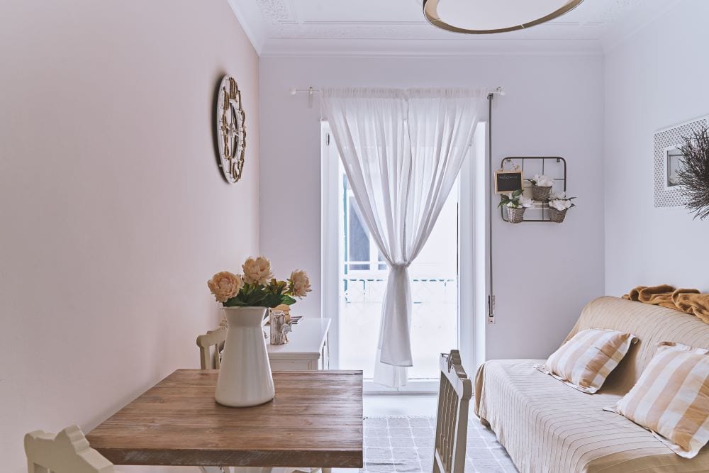 Living room with light, breezy curtains