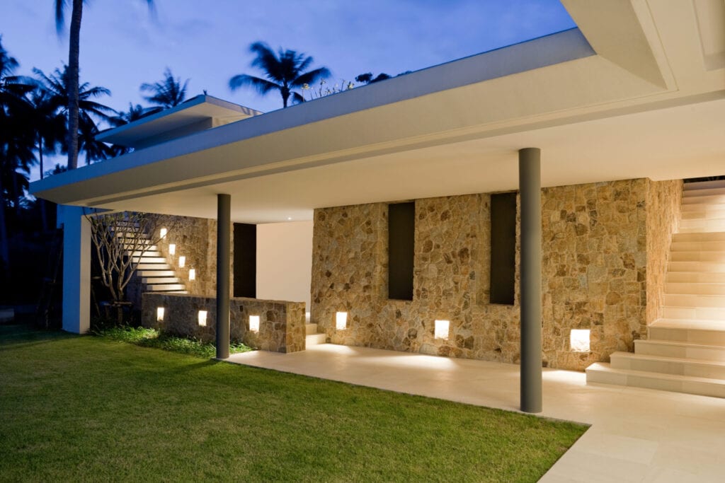 Outdoor Entrance, Walkway And Courtyard Of A Tropical Home.