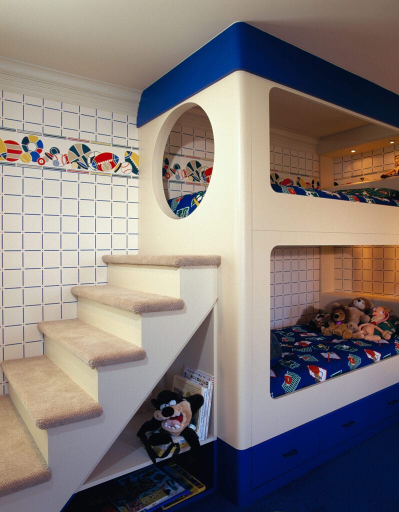 a child's bunk bed with stairs