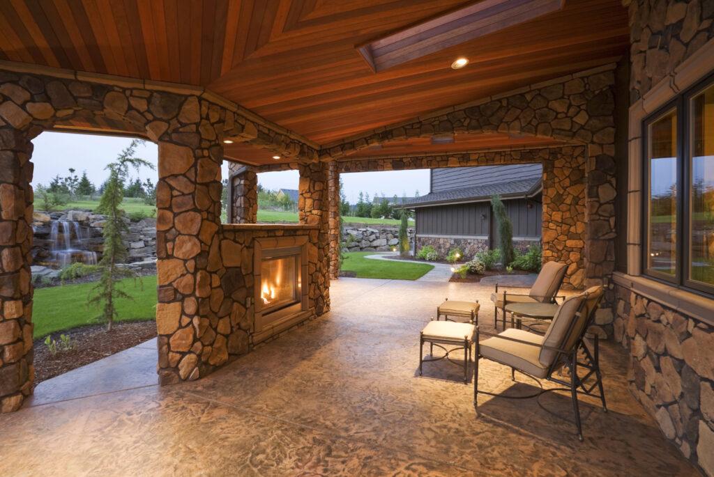 Covered patio with fireplace.