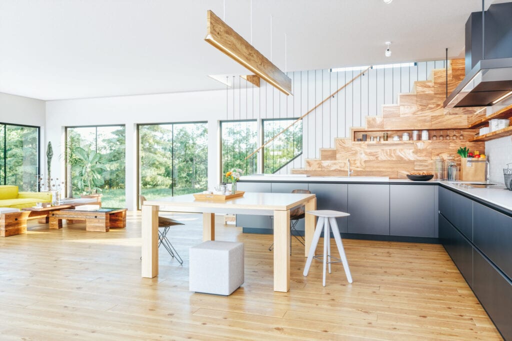 Open plan moderne keuken en woonkamer in een luxe huis.