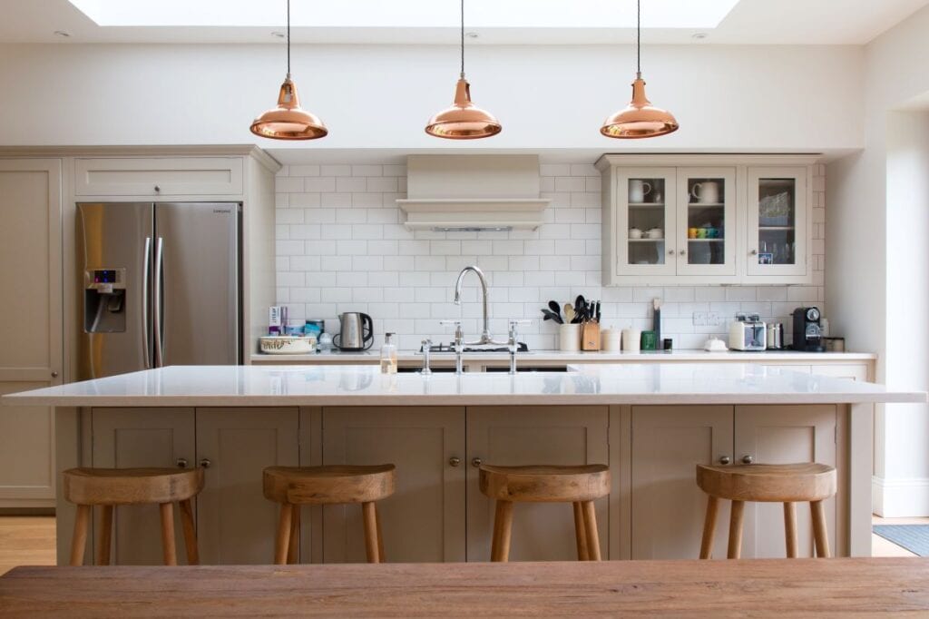 Interior of minimalist kitchen with subway tile backsplash