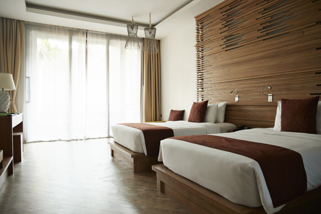 View of beds in hotel room at tourist resort