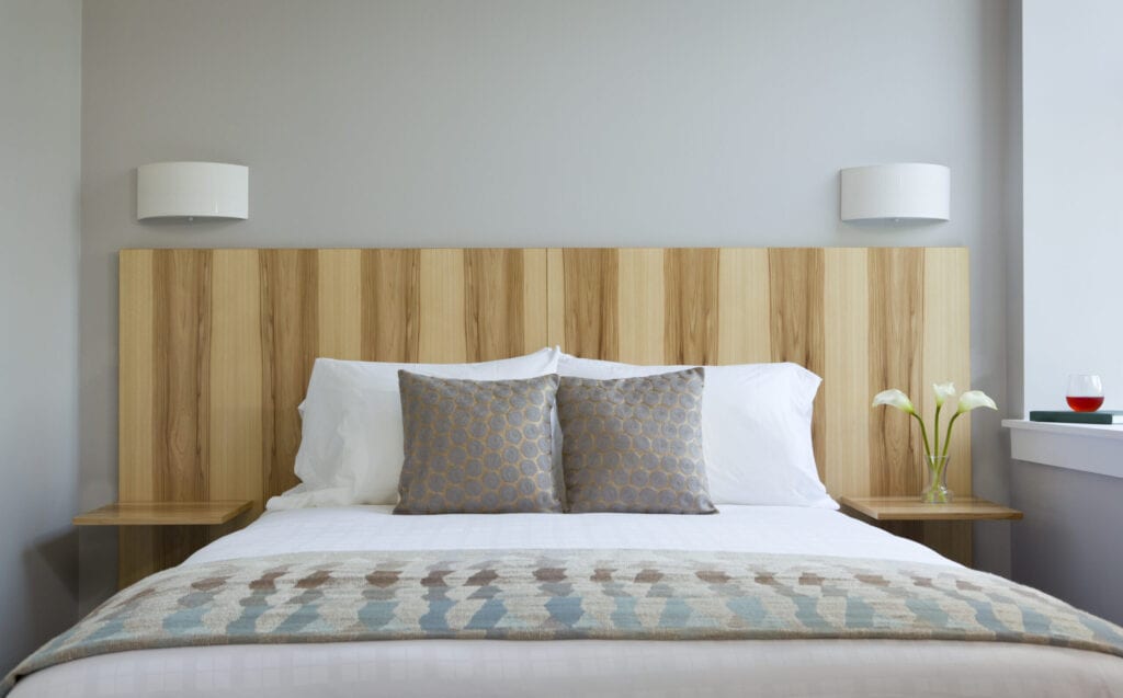 Bed and custom headboard, Ledges Boutique Hotel - Settlers Inn, Hawley, PA, USA