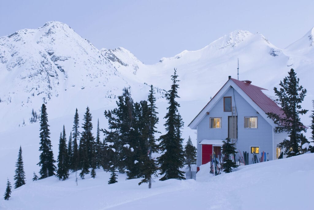 mountain house in snow 