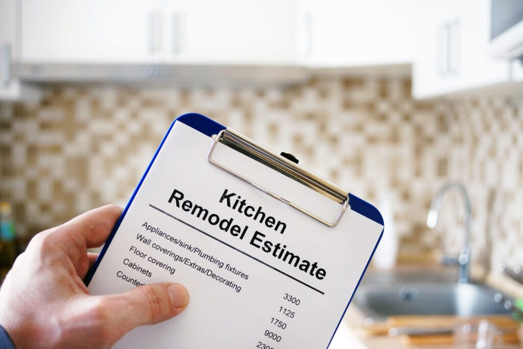 Clipboard with Kitchen remodel estimate. Cost of renovation. 