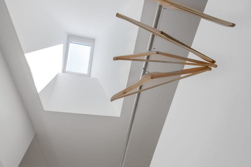 Clothes hanger under skylight