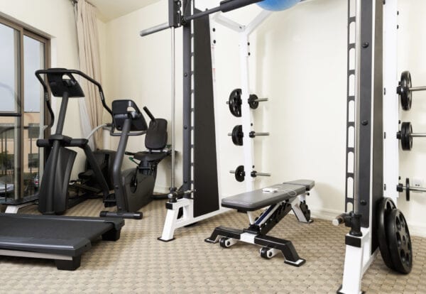Weights and exercise machines in gym