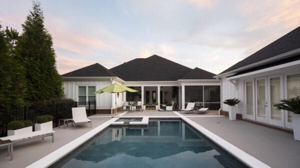 Modern patio overlooking pool.