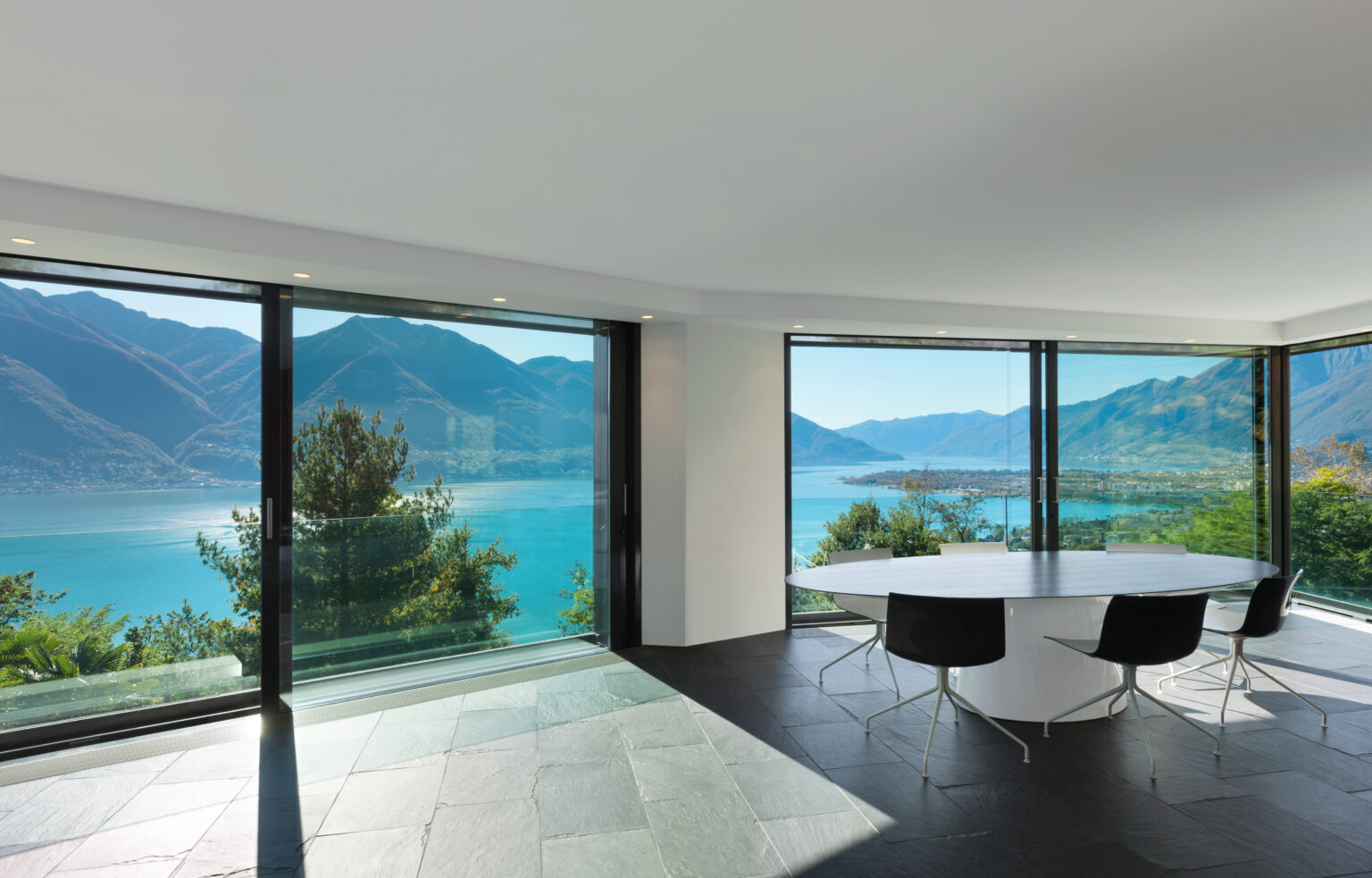 30 FloortoCeiling Windows Flooding Interiors with Natural Light