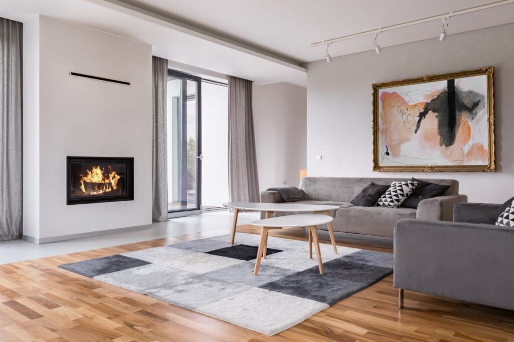 Modern living room with fireplace and patterned rug