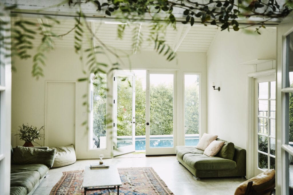 Living room overlooking backyard pool