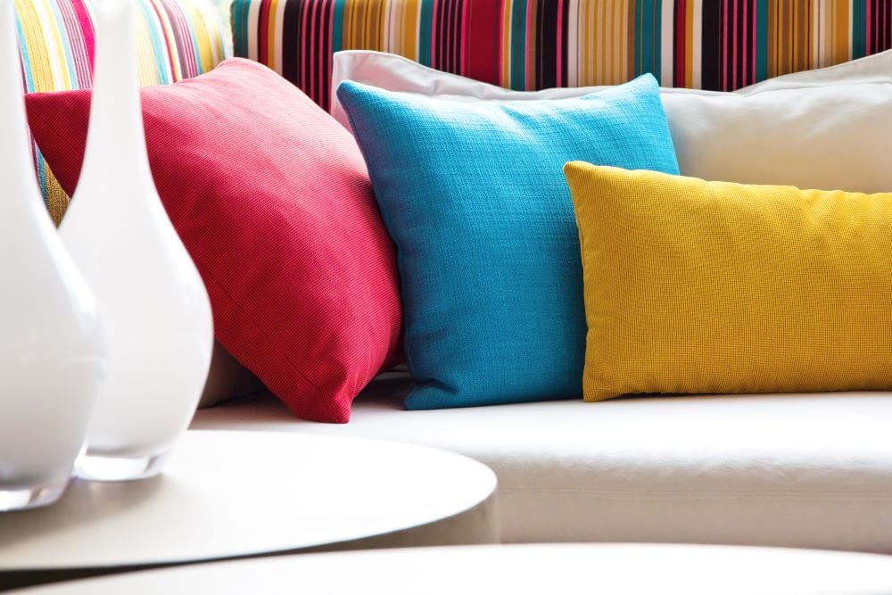 Close up of colorful pillows on couch