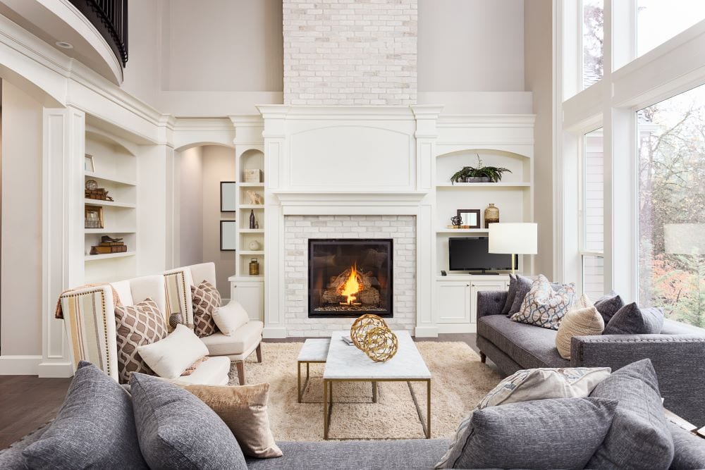 Luxury living room, fireplace and gray couches