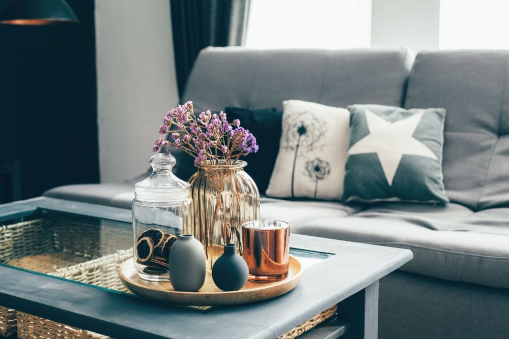 Close up of table in front of couch, interior design and decor