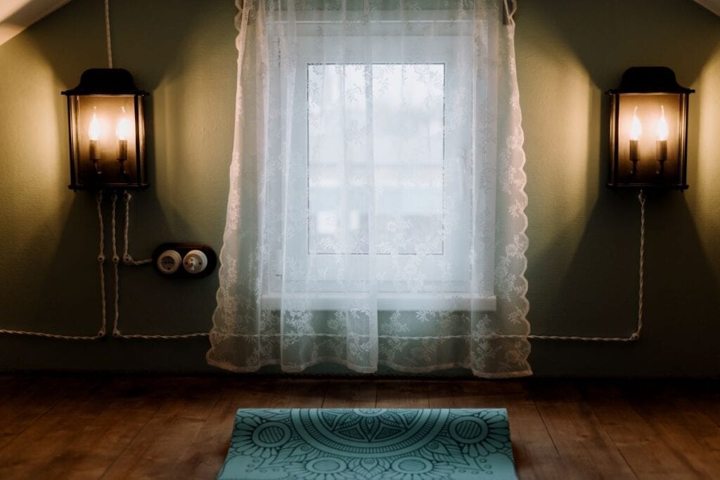 Yoga or meditation room with window and dim lights