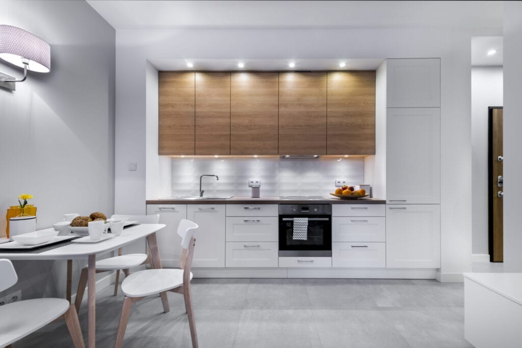 Modern kitchen interior design in white finishing