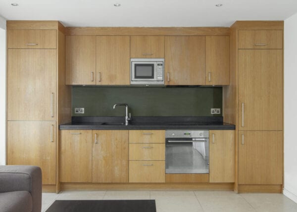 Wood kitchen in modern apartment