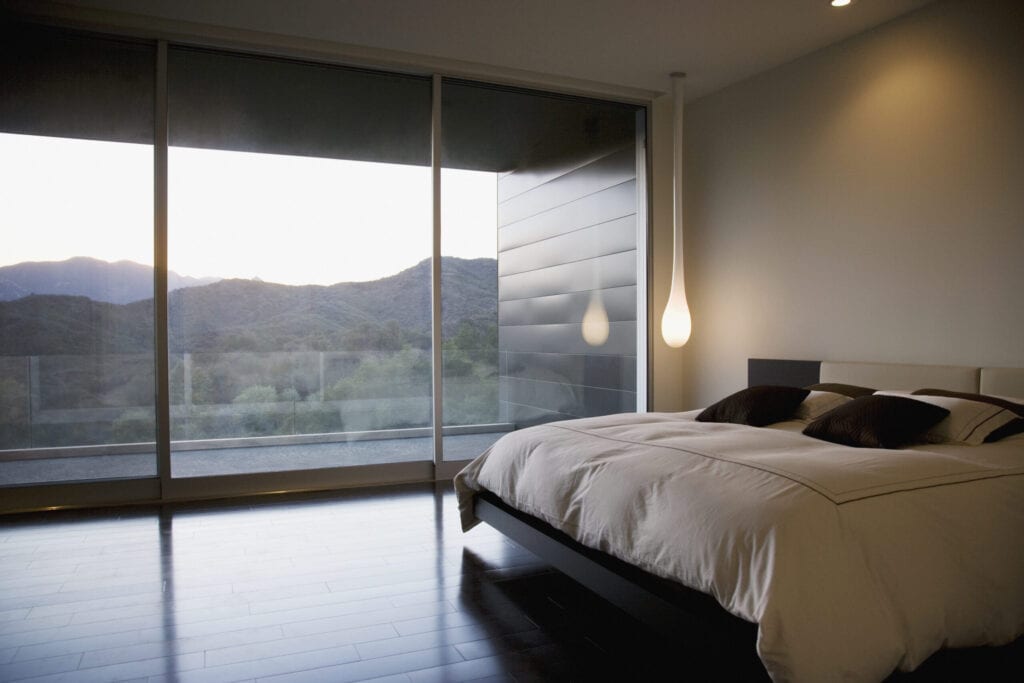 Modern bedroom and glass wall