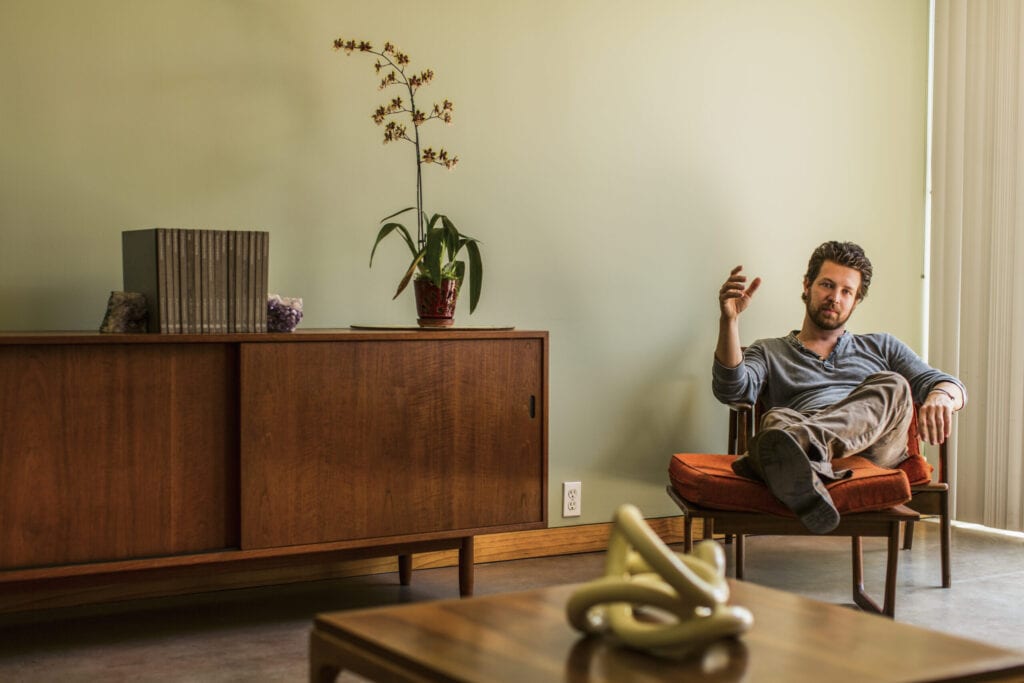 Caucasian man relaxing in living room