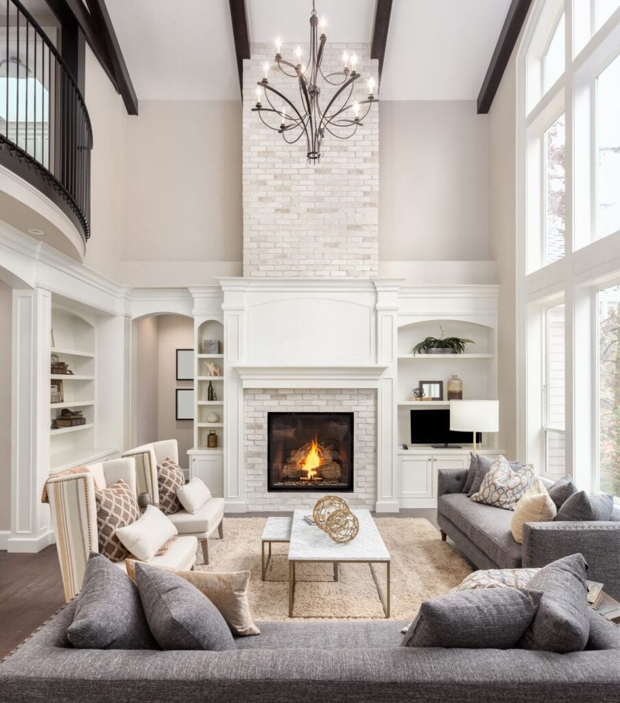 Transitional style living room with high ceilings