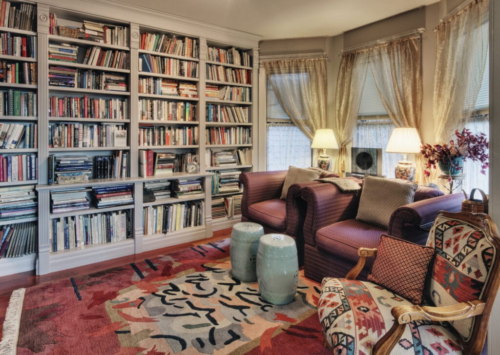 Armchairs and bookcases in living room