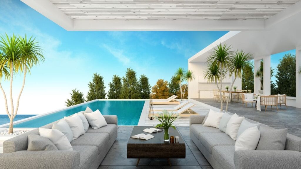 Modern, luxury patio set in front of pool