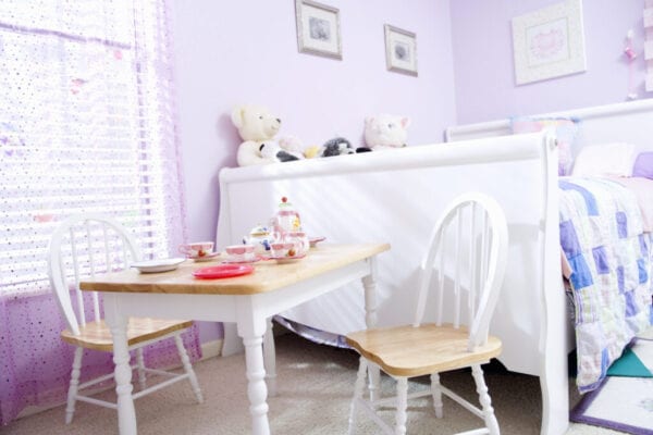 little girls bedroom with tea party set up