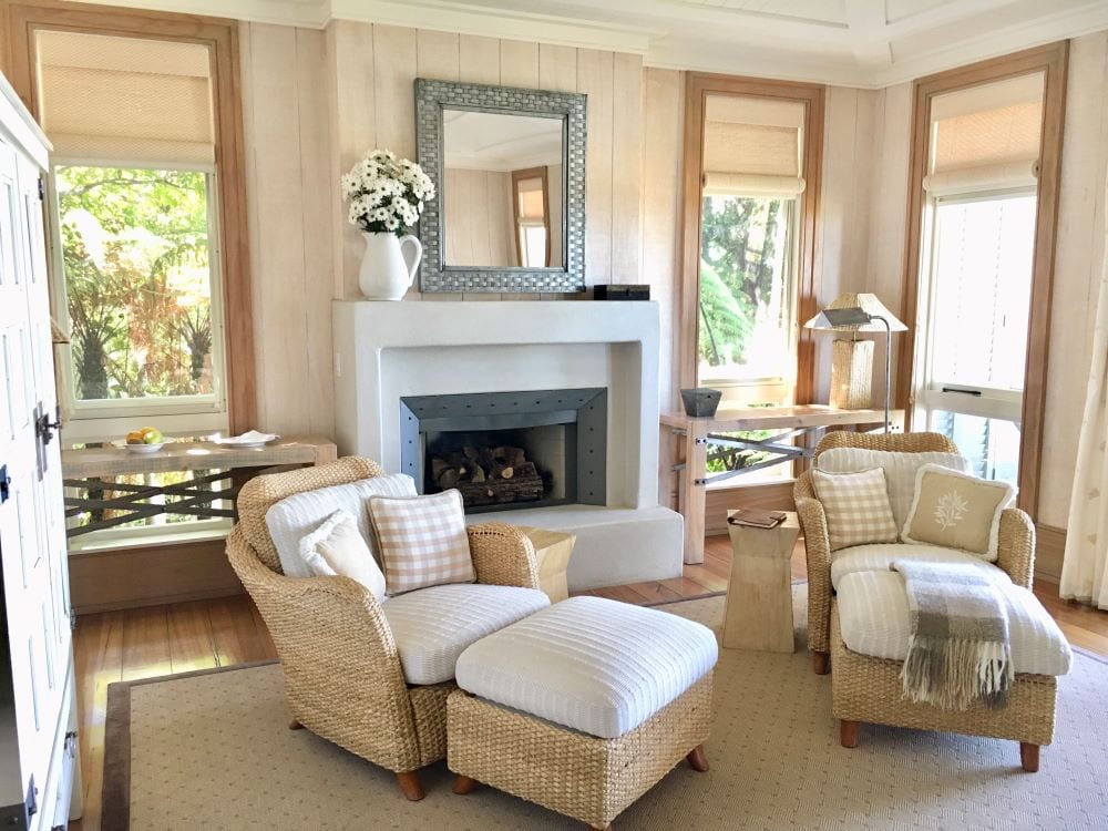 Mirror above fireplace in luxury living room