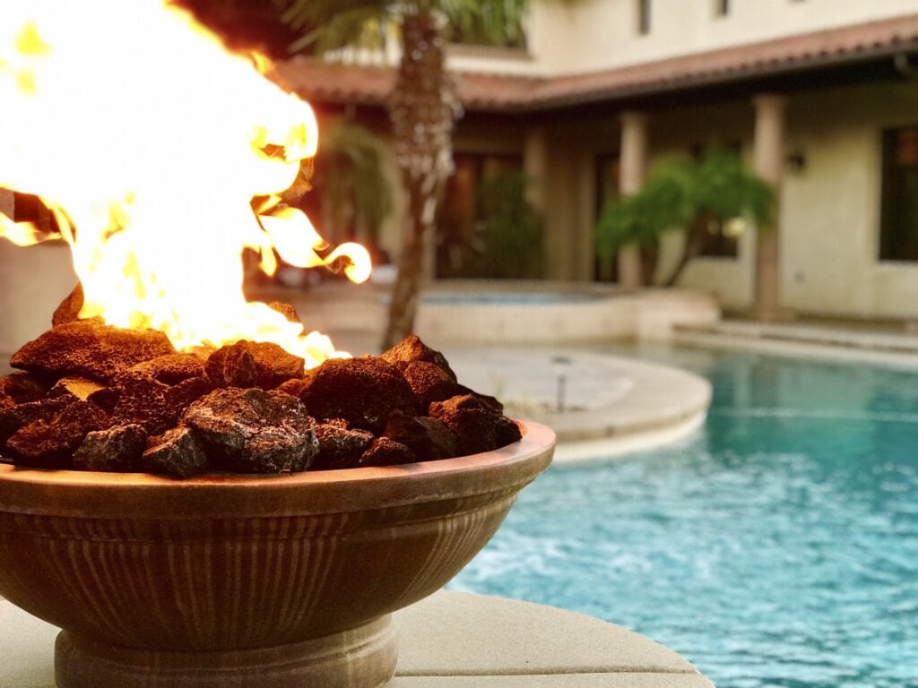 Fire pit by a pool