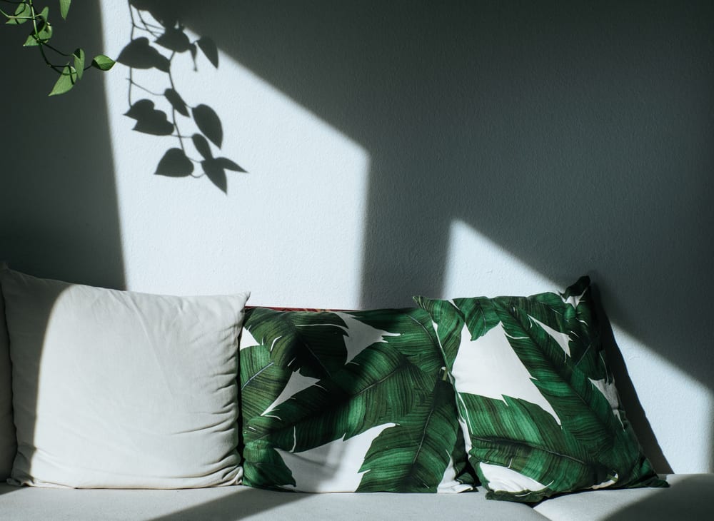 Tropical leaf print pillow