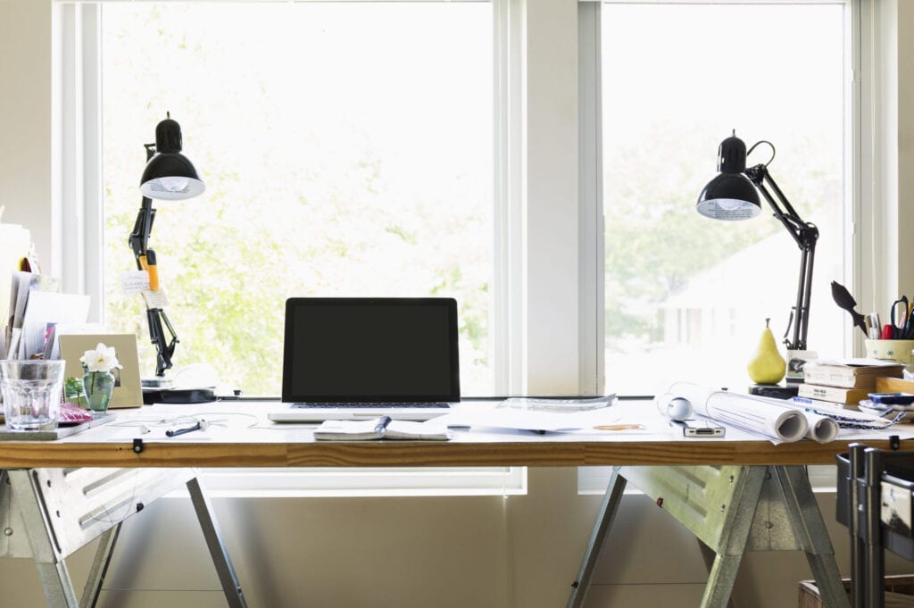 Computer and lamps on desk