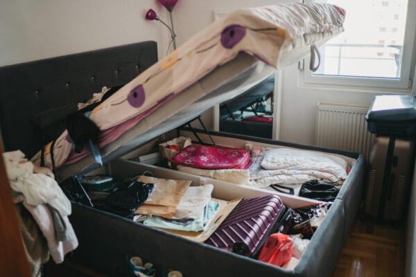 Pile of things in the bed drawer