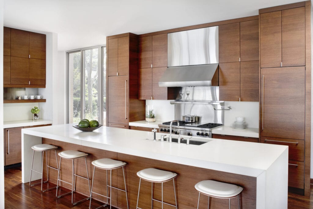 Modern kitchen with breakfast bar and stainless appliances