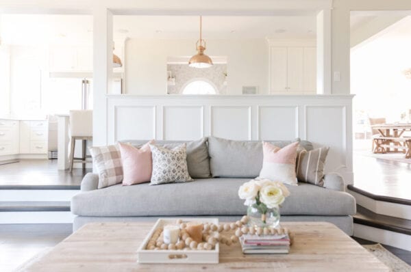 interior white sitting room and kitchen