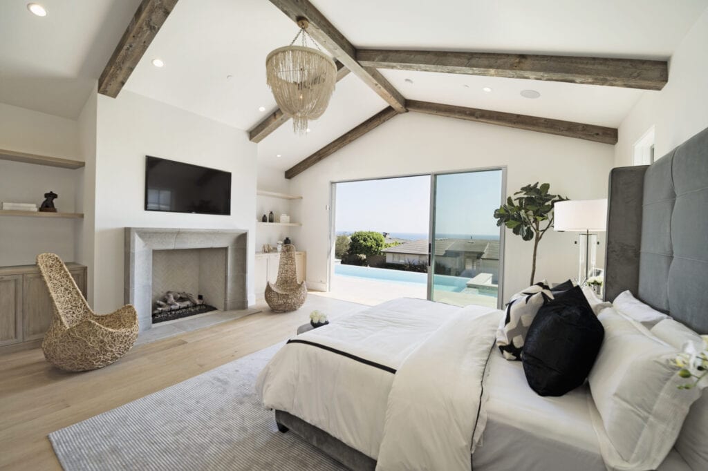 Bed and fireplace in luxury bedroom