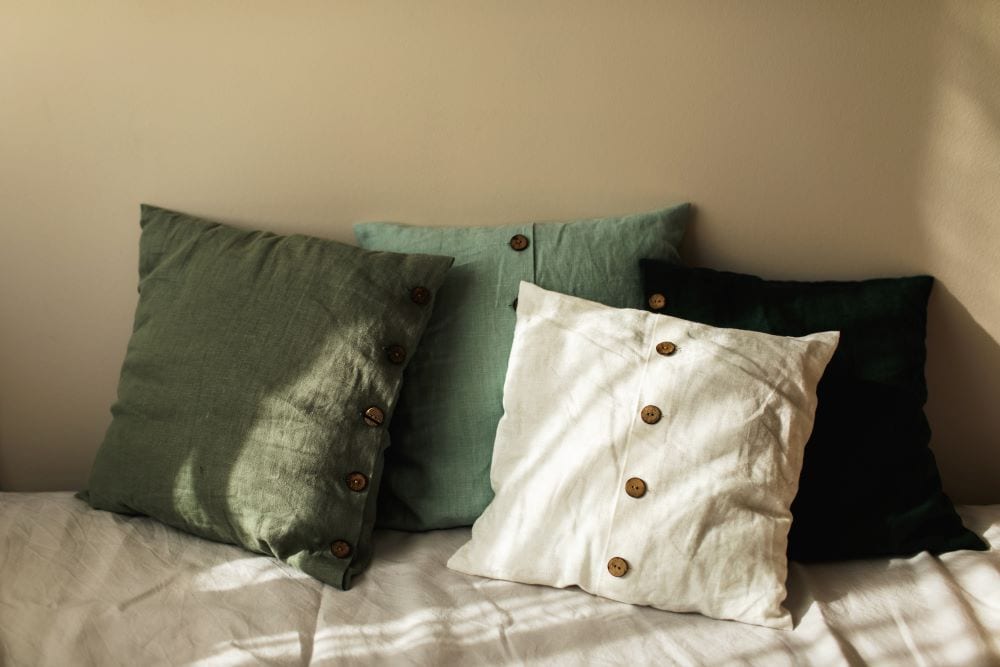 Pillows with mixed shades of green and white