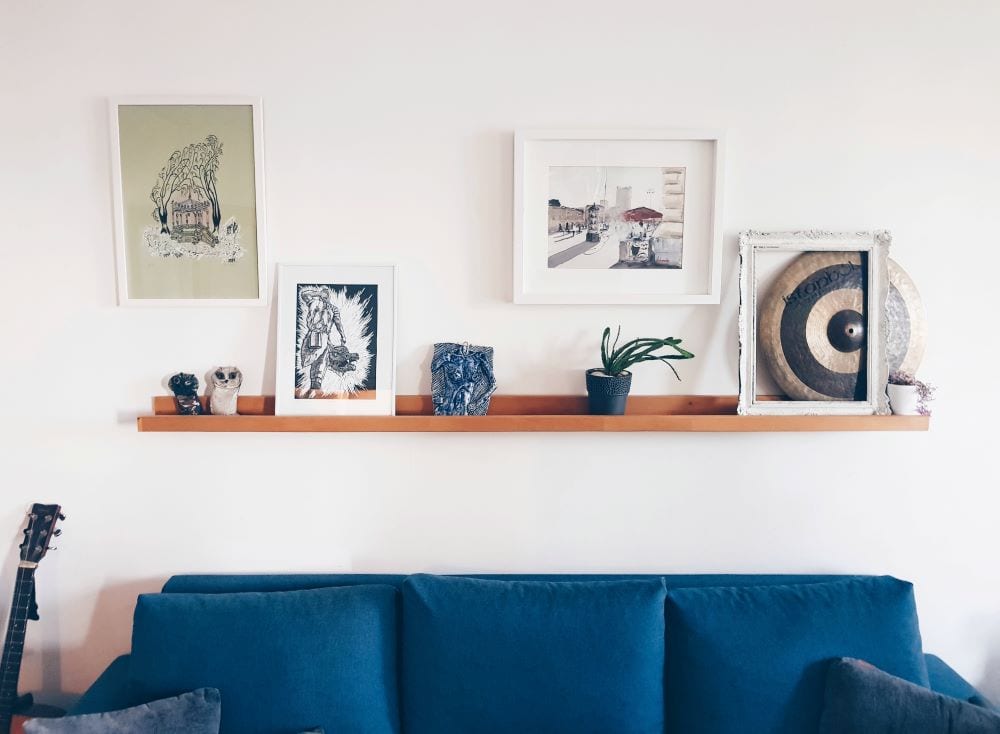 Modern living room with blue teal couch