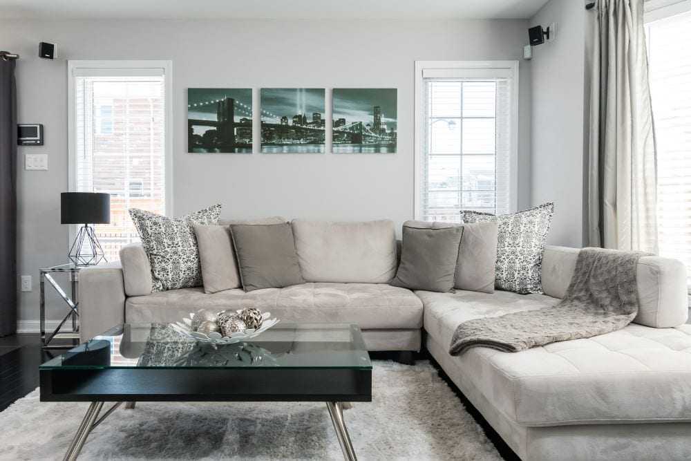 Mid century modern family room, gray couch, neutral colors