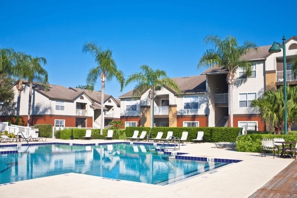 Apartment complex with swimming pool amenities