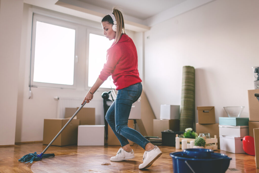 Woman cleans new apartment