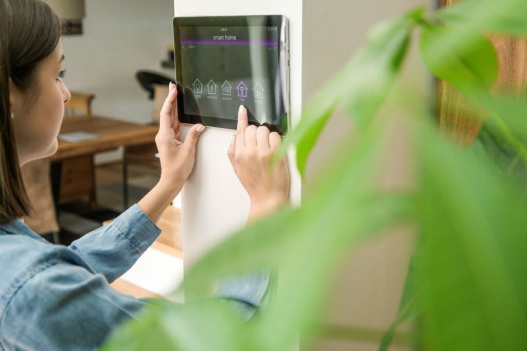 Woman using tablet in smart home