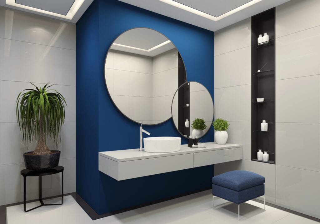 Dark blue accent wall in bathroom