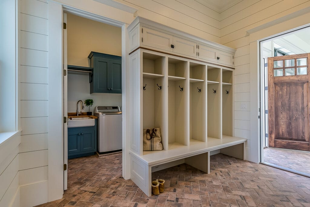 Gorgeous flooring and cubbyholes in newly built Tour home