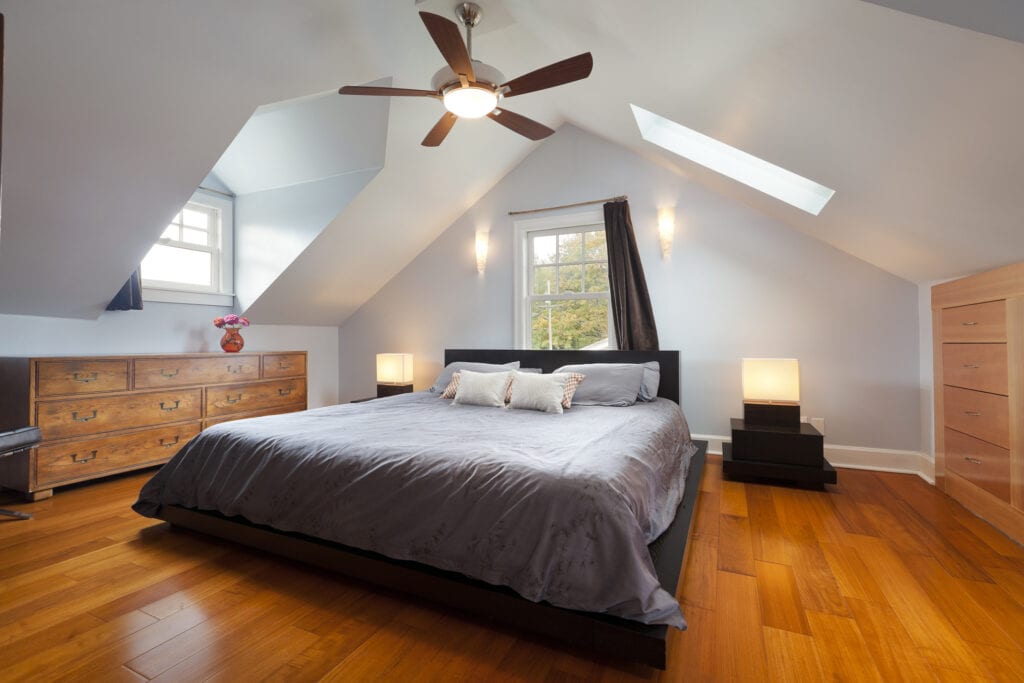 Master bedroom in large attic space.