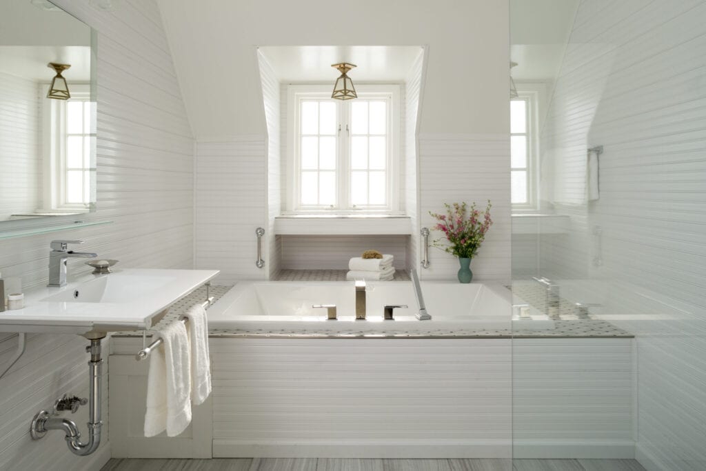 Luxury white bathroom with bathtub and tile, Settlers Inn, Hawley, Poconos Region, Pennsylvania, USA