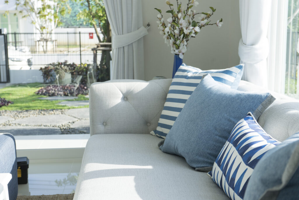 coastal blue cushions and sofa living room