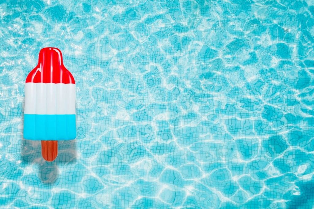 Red, white, and blue popsicle-shaped pool float